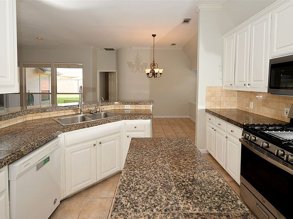 2nd image of 7410 Woodsprings Dr