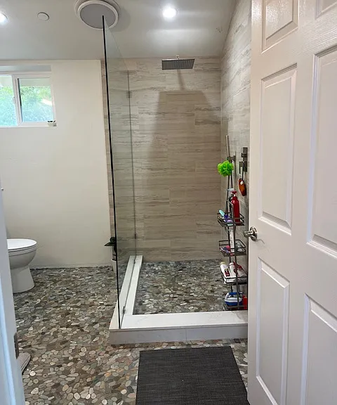 master bath with walk in shower, Rain showerhead, radiant heat floor.