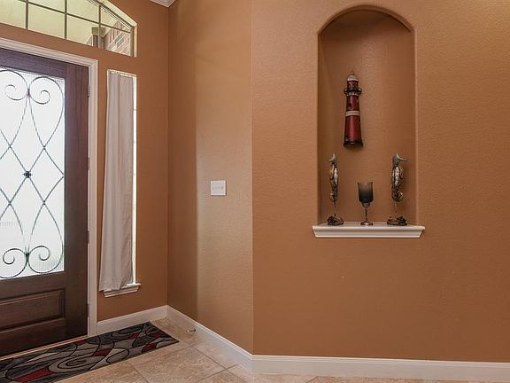 The sunlight floods into this beautiful entry! With a gorgeous glass door and sidelight windowsâyouâll be proud to welcome your guests into this cheerful foyer.