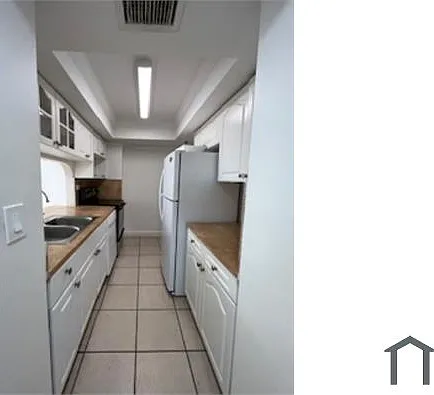 7545 E Treasure Dr — Photo 1