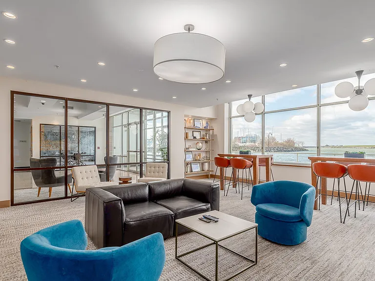 Resident lounge offering stunning waterfront views