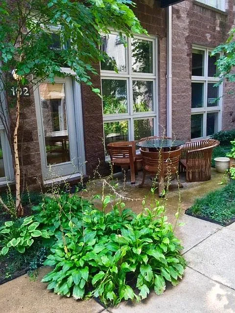 Front door with partial view of private patio - 2380 Champlain St NW