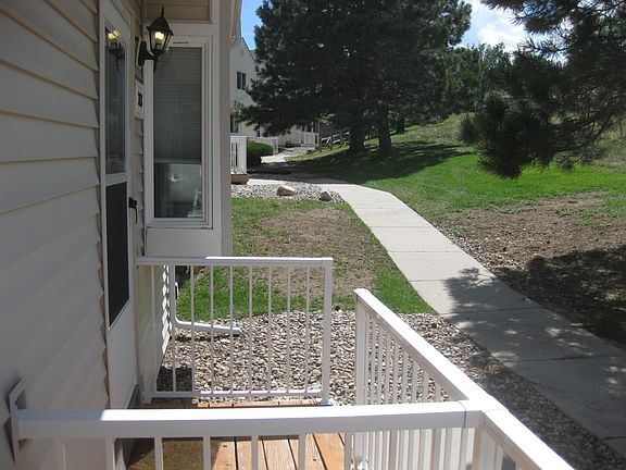 Front of townhouse includes this walking path and lots of open space with another trail