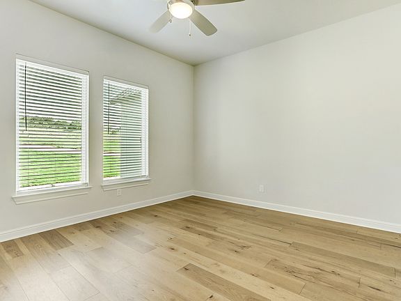 The Mantle features an incredible study with two windows and wood flooring.