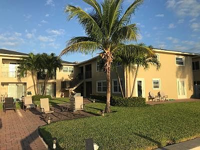 Unit 101 is the corner unit to the right with the french doors