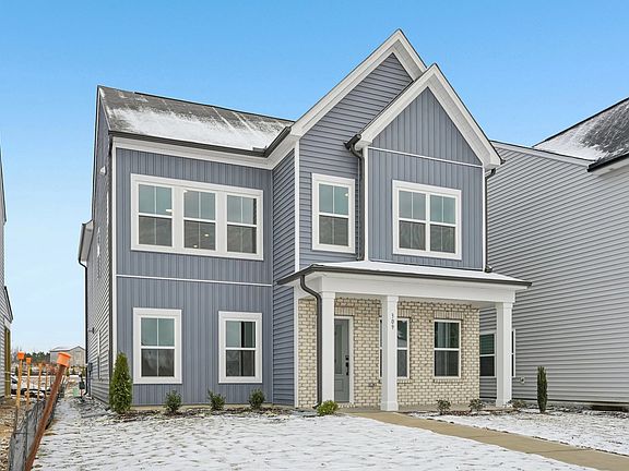Exterior - Earthy textures and warm tones feel rooted in place.