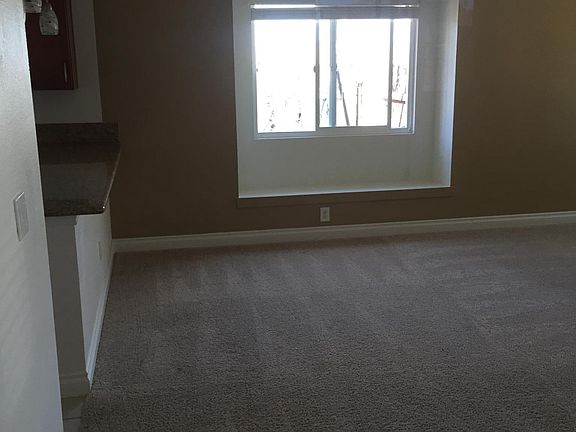 Living Room with Kitchen to the Left