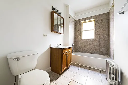 7109-15 S Ridgeland Ave 1736-44 E 71st Pl Chicago, IL 60649 Photo 1