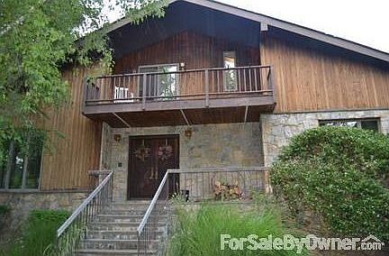 Stonework, Porch & Balcony greet you as you make your way home - your paradise