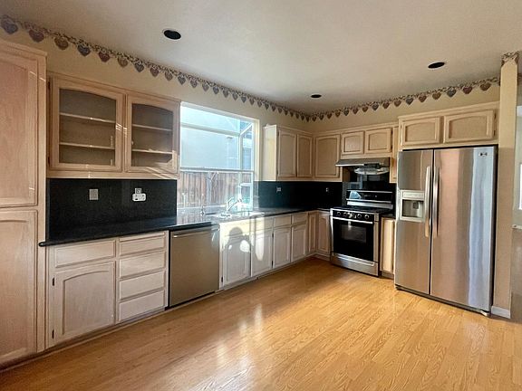 Kitchen with stainless steel appliances.