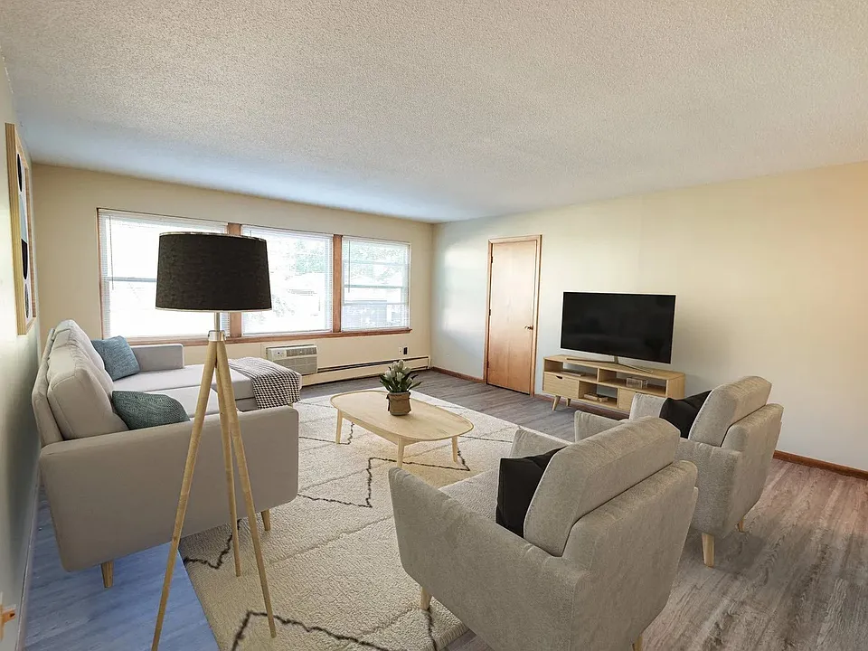 Welcome to Central Lakes of Uptown, where modern comfort meets stylish living. Enjoy spacious layouts and natural light in this inviting living room. Step into your dream home today and schedule a tour to find your perfect space!