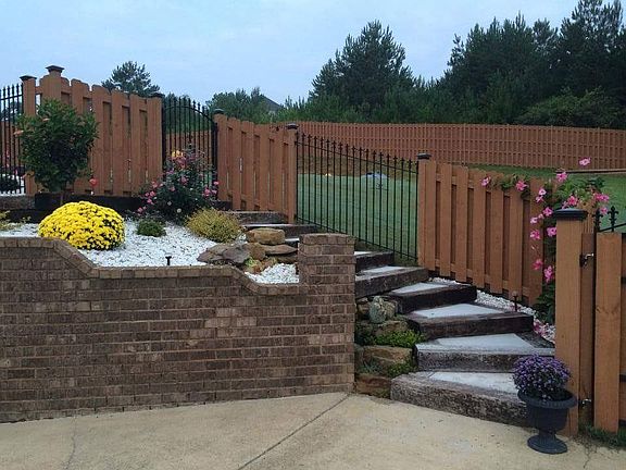 Stairs driveway to backyard