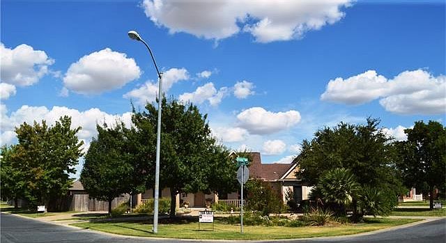 Beautiful corner lot home with amazing landscaping!
