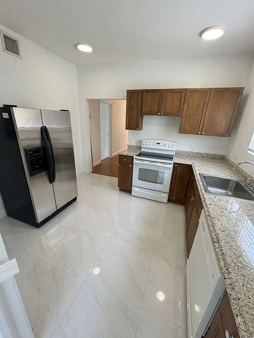 Newly Renovated 3 Bedroom Home | Heart of Riviera Beach — Photo 2