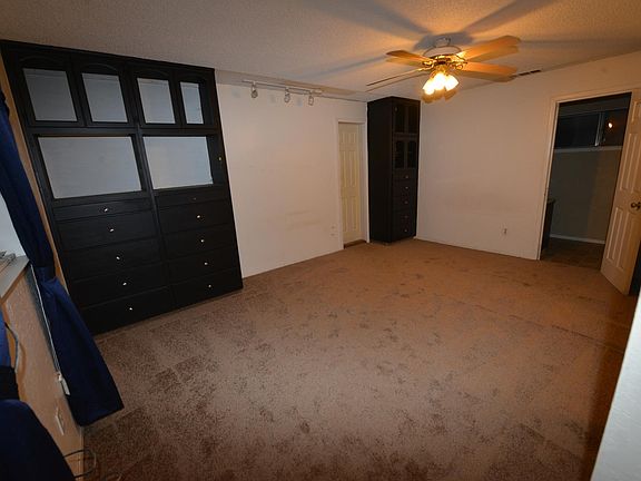 Master Bedroom with built in dressers
