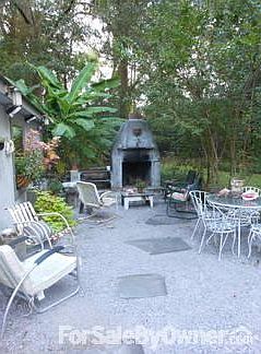Backyard patio and outdoor fireplace