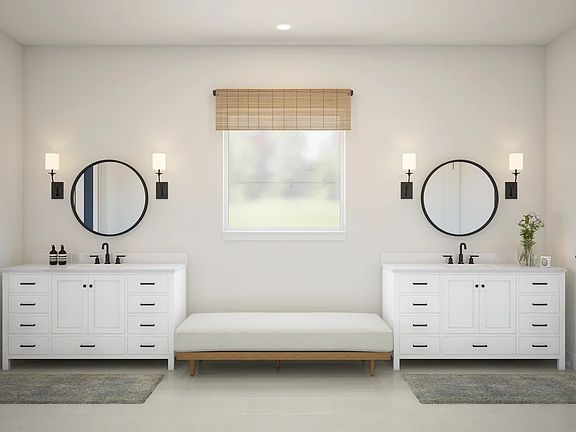 Primary bath with dual freestanding vanities