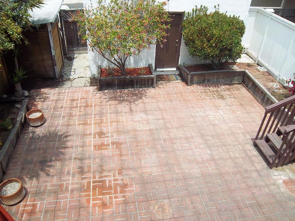 Rear yard and garages in 34th place alley