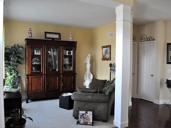 Formal Living Room - includes curtain rods and curtains