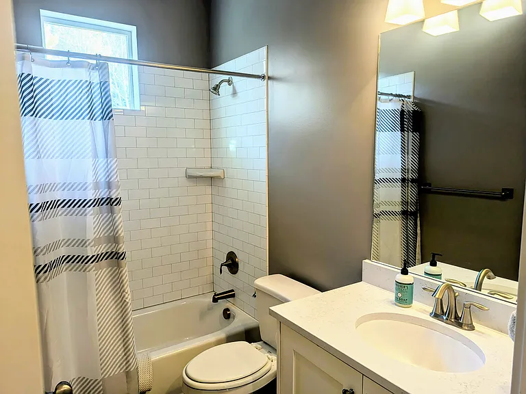 Upstairs bathroom next to the upstairs bedroom and flex room.