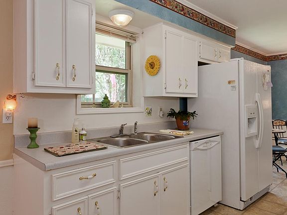 Bright kitchen-sink and flooring replaced in June.