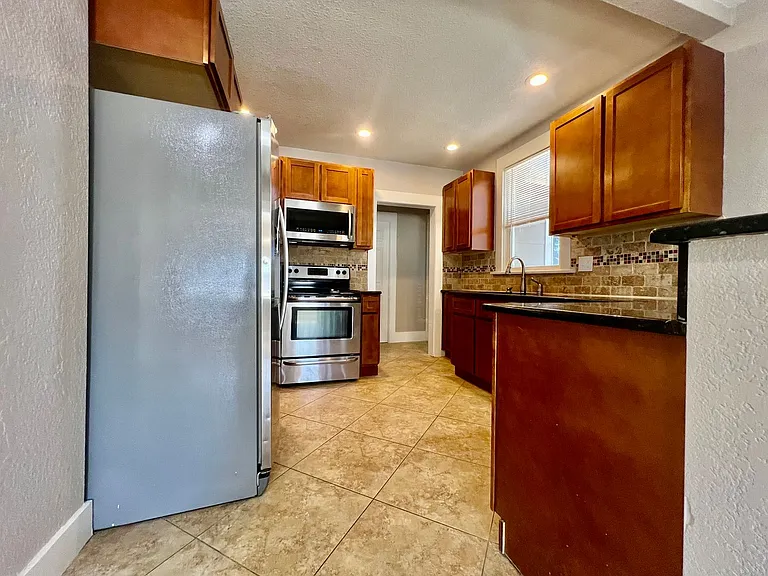 6531 Monaco St — Photo 8