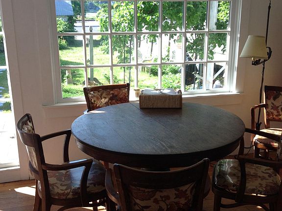 Eating area with view of garden.
