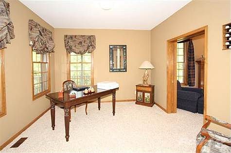 In the study you will find new carpet, 3 large windows and pocket doors that lead to the living room.