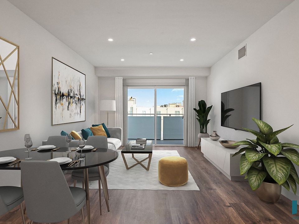 Living Room with Patio, Recessed Lighting, and Vinyl Flooring