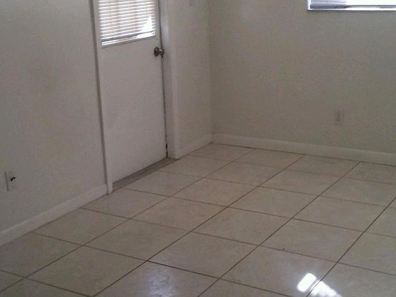 Roomy Master Bedroom has a back door to patio