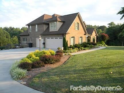 Front and left Side View with Driveway