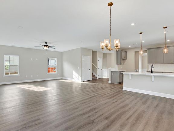 Oscar Mulberry Open-Concept Living Area - Ernest Homes