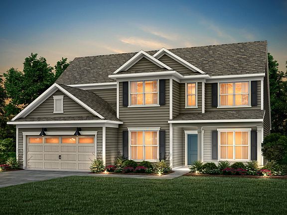 Vanderbilt Exterior 51 features siding, covered front sitting porch and 2 car garage