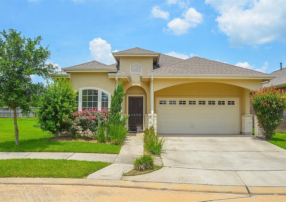 Gorgeous one story with stucco and stone elevation and great curb appeal!