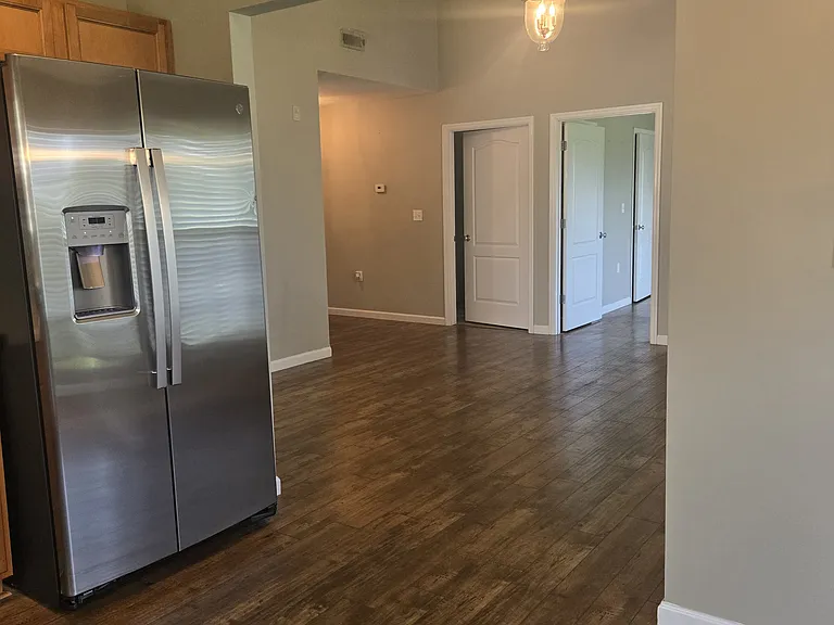 Kitchen looking towards living space
