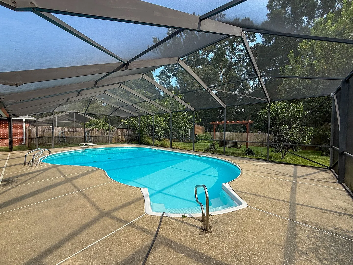 4 Bedroom 3 Bath House in Cantonment with a Pool & Solar Panels! — Photo 2