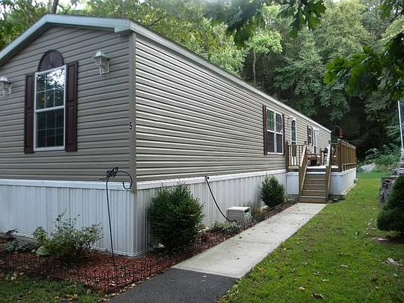 Large lot w/ paved driveway