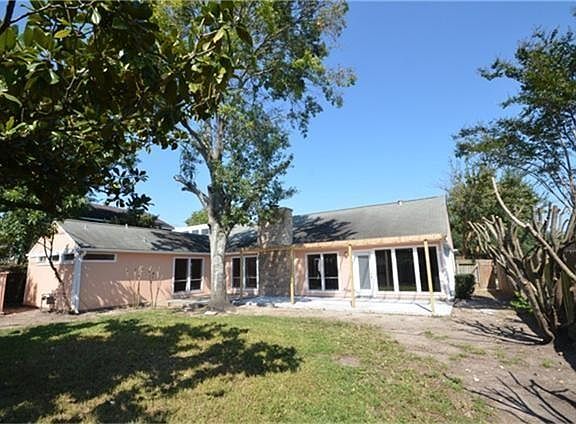 Super backyard with both concrete and patio deck. Large greenspace and even a shed.