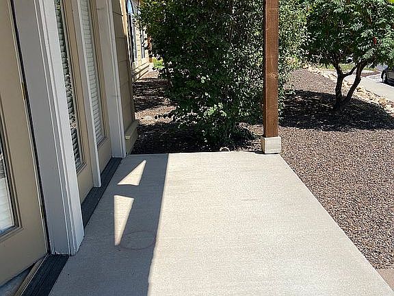 Front porch faces open area