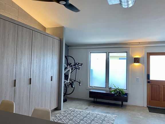 View of entry, bike storage, built-in closets (left)