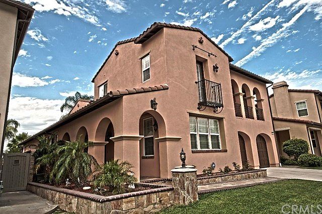 Front - Lovely Spanish style with mature landscaping