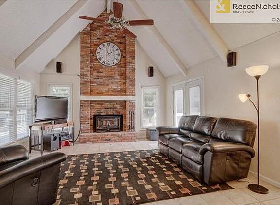 Large Family Rm. Country Flame fireplace insert is wood burning with an electric fan---amazing addt'l  heating source!