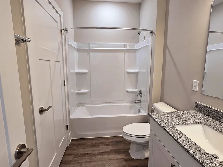 A bathroom of an available apartment at Greenwood Commons Apartments in Delaware, OH.