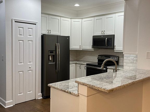 2nd image of 9418 W Park Village Dr APT 102