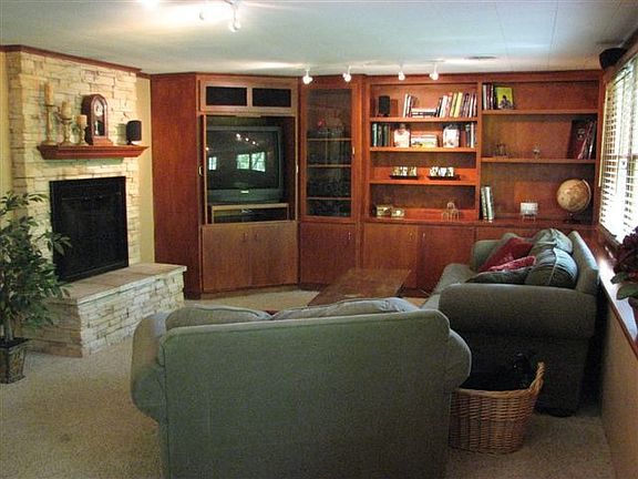 Family Room, w/ Wood burning fireplace