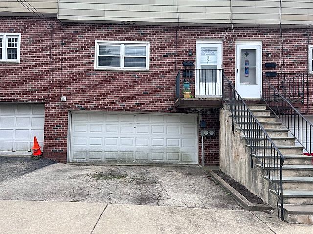 garage with storage & one drive way spot outside off street