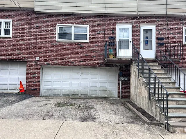 garage with storage & one drive way spot outside off street