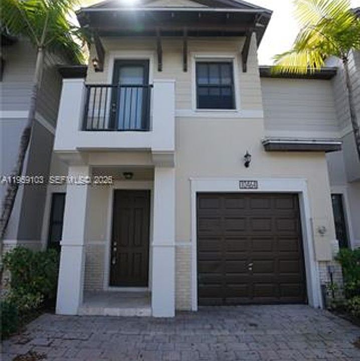 1st image of 10464 NW 61st Ln #Townhouse 10464