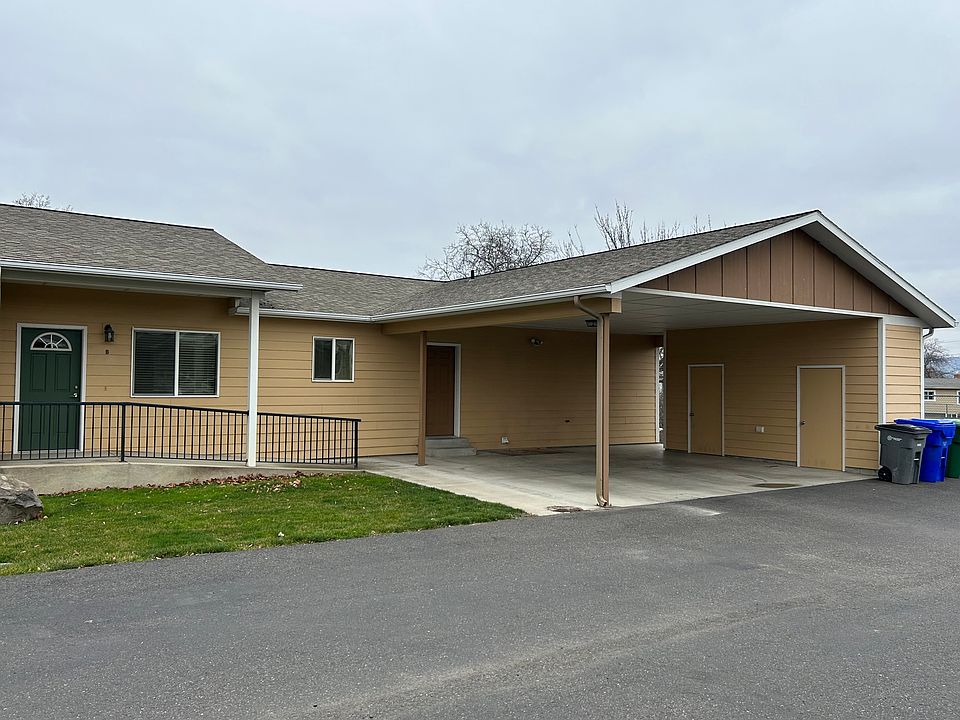 Front of unit with carport