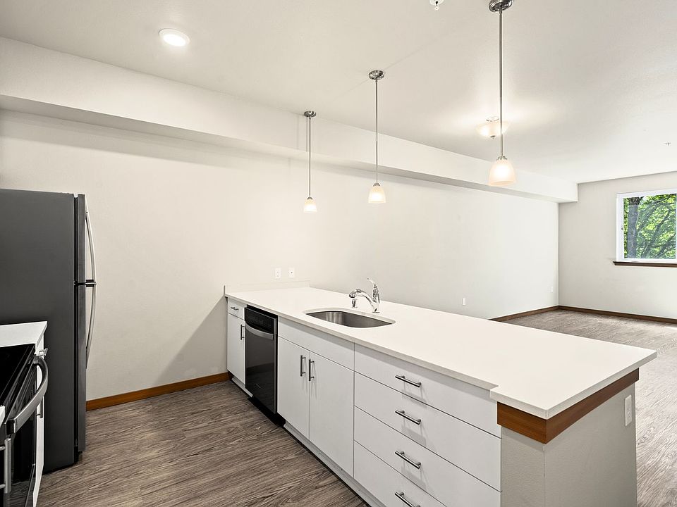 2nd image of 8609 Locust Ave E #205